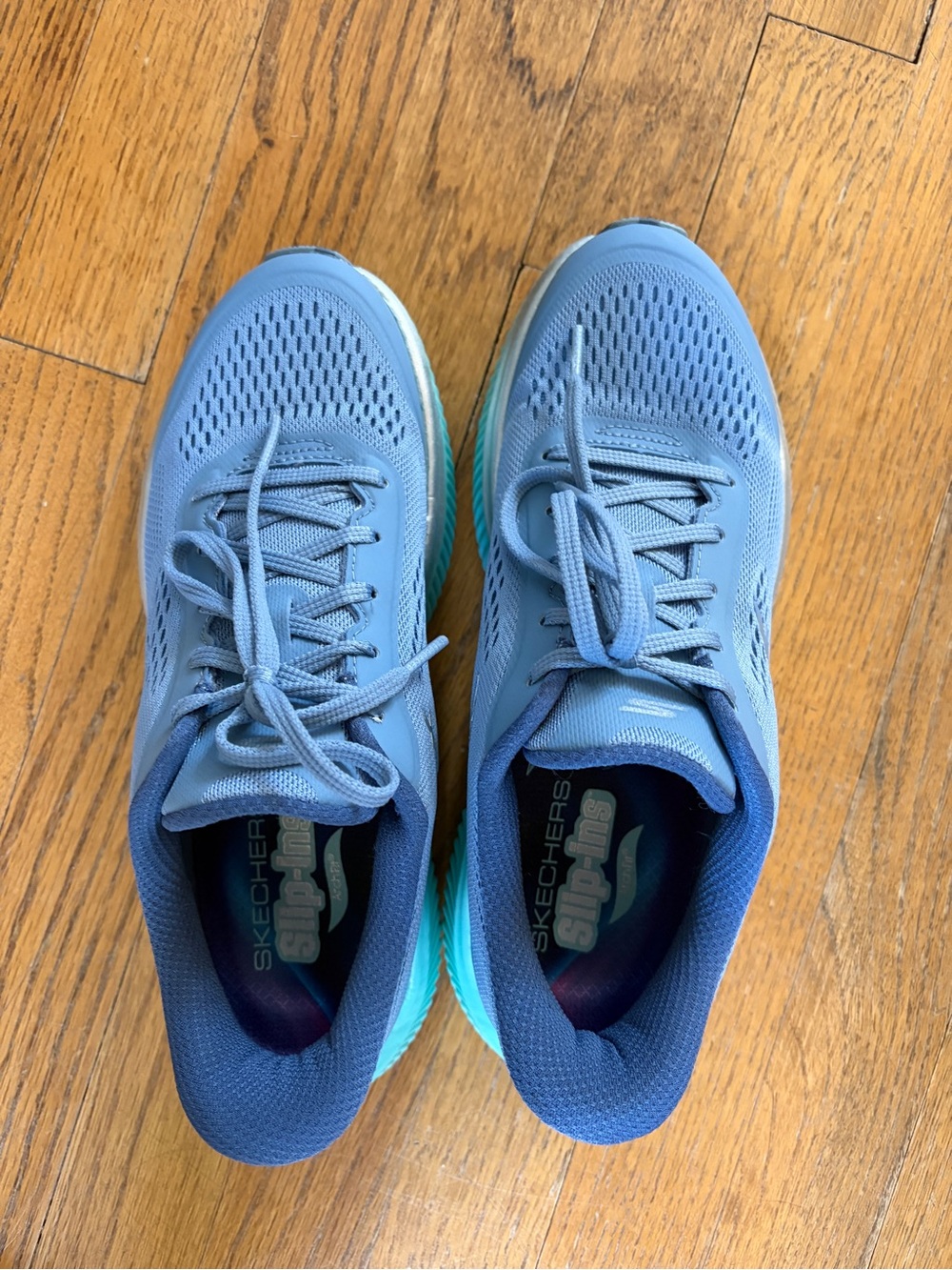 Skechers Women's Light Blue Athletic Slip-On Sneakers with Teal Accents
